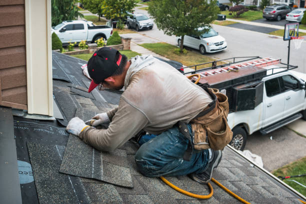 Professional Roofing technician working in Schwertner, TX